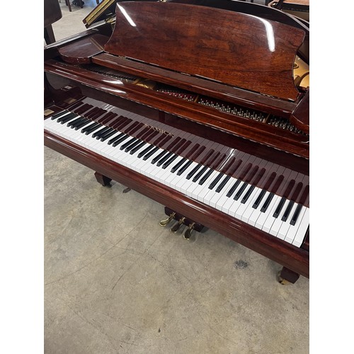 68 - Samick (c1997)A 5ft Model SG-155 grand piano in a bright mahogany case on square tapered legs; toget... 