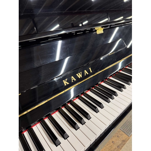 19 - Kawai (c2014)A Model K15-E upright piano in a bright ebonised case; together with a matching stool.... 