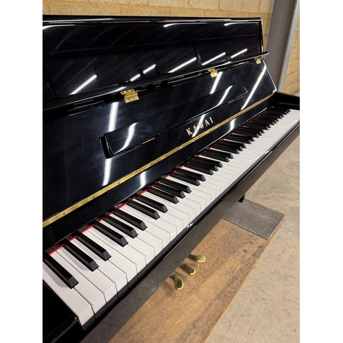 19 - Kawai (c2014)A Model K15-E upright piano in a bright ebonised case; together with a matching stool.... 