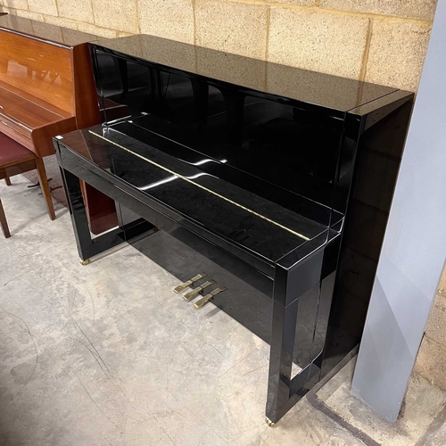 25 - Feurich (c2013)A Model 115 upright piano in a traditional bright ebonised case; together with a stoo... 