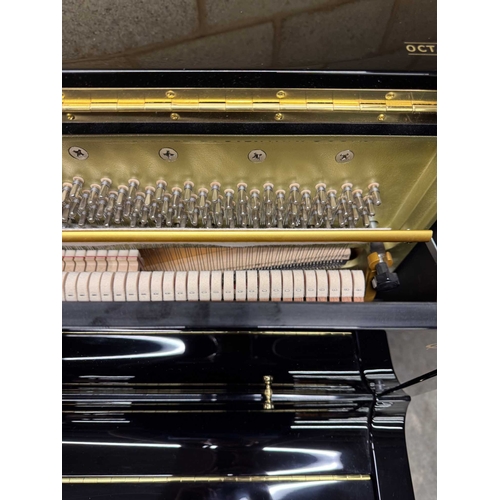 27 - Boston (c2019)A Model UP118 upright piano in a traditional bright ebonised case; together with a mat... 