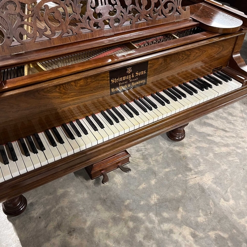 29 - Steinway (c1885)A 6ft 'old style' Model A grand piano in a rosewood case on turned and fluted legs; ... 