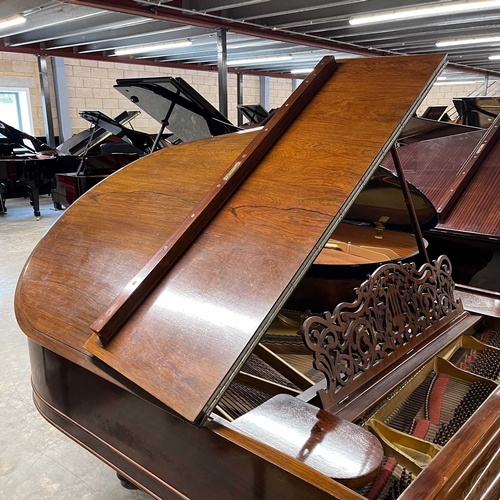 29 - Steinway (c1885)A 6ft 'old style' Model A grand piano in a rosewood case on turned and fluted legs; ... 