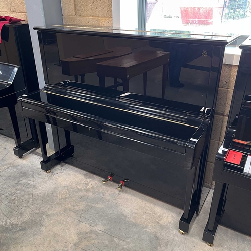 30 - Steinway (c2016)A Model K upright piano in a traditional bright ebonised case.