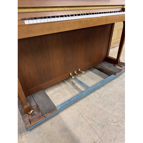 4 - Schimmel (c1993)An upright piano in a traditional satin walnut case; together with a stool.