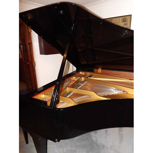 41 - Boston (c2007)A 6ft 4in Model GP193 grand piano in a bright ebonised case on square tapered legs; to... 