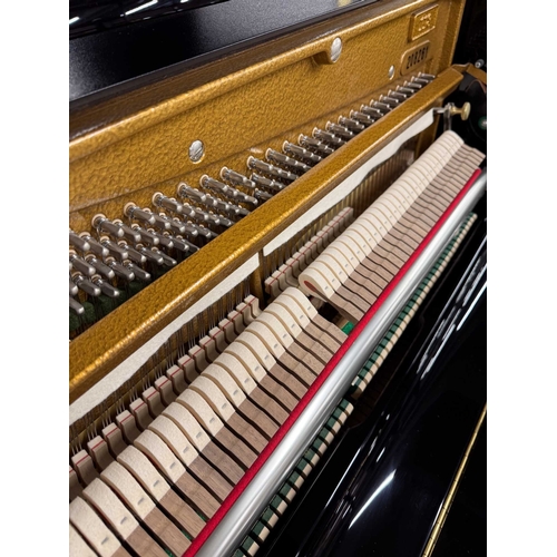 55 - Bechstein (c2012)A Model 118 Contur upright piano in a traditional bright ebonised case; together wi... 