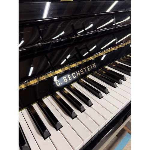 55 - Bechstein (c2012)A Model 118 Contur upright piano in a traditional bright ebonised case; together wi... 