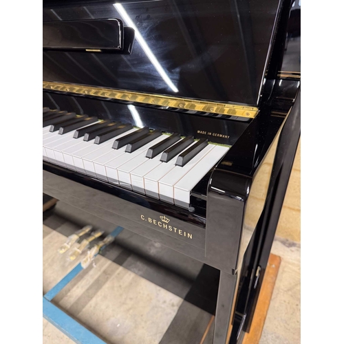 55 - Bechstein (c2012)A Model 118 Contur upright piano in a traditional bright ebonised case; together wi... 