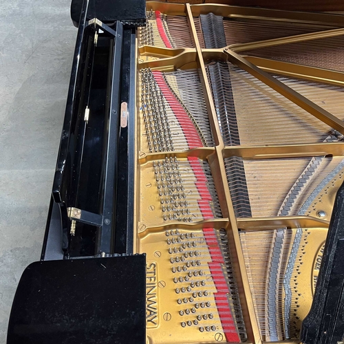 60 - Steinway (c2001)A 6ft 11in Model B grand piano in a bright ebonised case on square tapered legs.... 