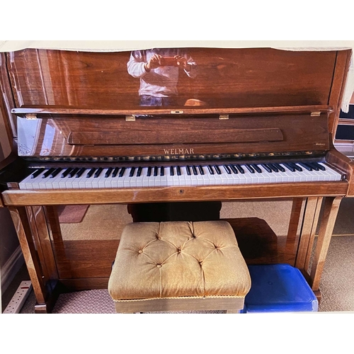 63 - Welmar (c1980s)An upright piano in a traditional bright mahogany case; together with a stool.