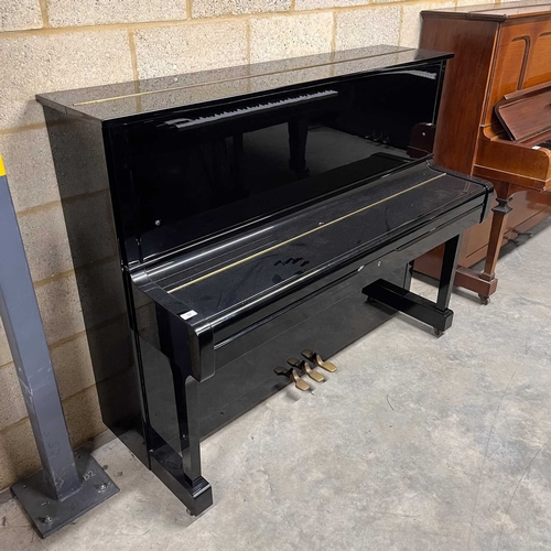 71 - Yamaha (c1975)A Model U1H upright piano in a bright ebonised case; together with a matching stool.... 