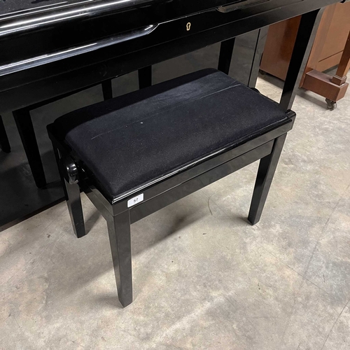 71 - Yamaha (c1975)A Model U1H upright piano in a bright ebonised case; together with a matching stool.... 