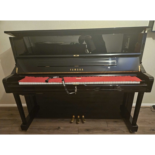 88 - Yamaha (c2015)A Model U1 Transacoustic traditional upright piano in traditional bright ebonised case... 