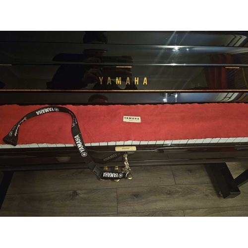 88 - Yamaha (c2015)A Model U1 Transacoustic traditional upright piano in traditional bright ebonised case... 