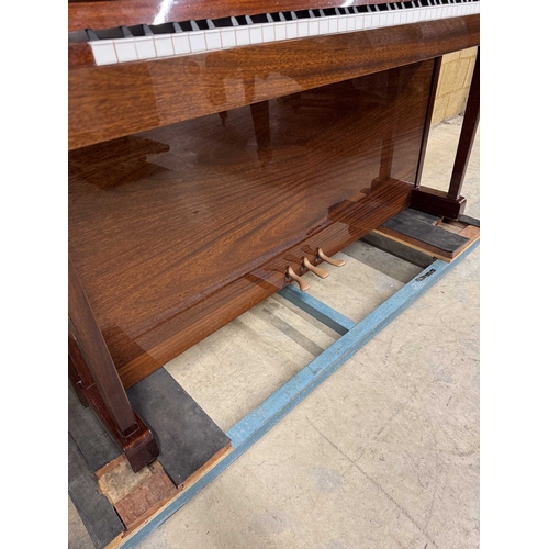 9 - Sauter (c1985)A Model 110 upright piano in a traditional bright mahogany case; together with a stool... 