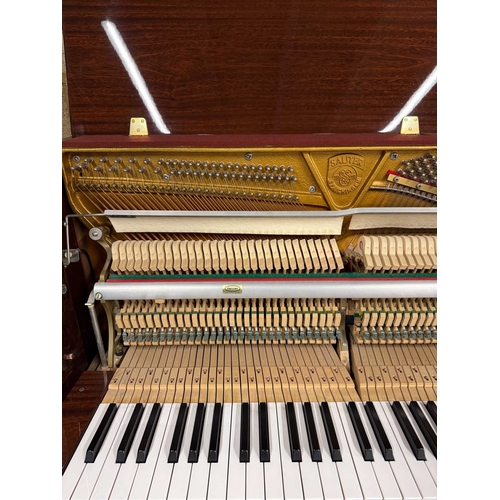 9 - Sauter (c1985)A Model 110 upright piano in a traditional bright mahogany case; together with a stool... 