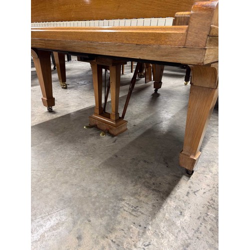 5 - Steinway (c1922)A 5ft 10in Model O grand piano in a rosewood case on square tapered legs; together w... 