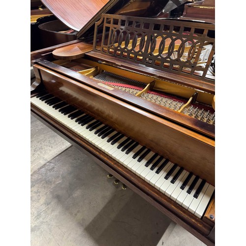 14 - Steinway (c1912)A 6ft 11in Model B grand piano in a rosewood case on square tapered legs; together w... 