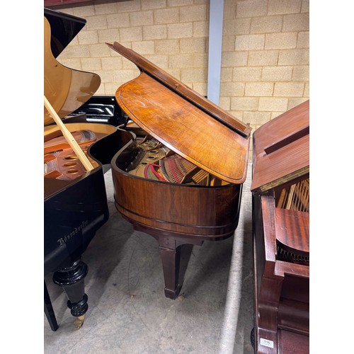 14 - Steinway (c1912)A 6ft 11in Model B grand piano in a rosewood case on square tapered legs; together w... 