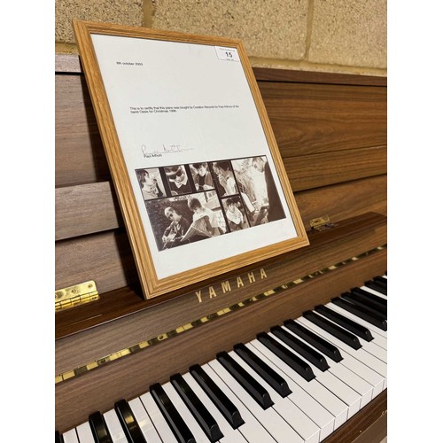 15 - Yamaha (c1996)A Model E108 upright piano in a walnut case; once the property of Paul Arthurs of Oasi... 