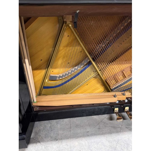 17 - Welmar (c1987)A Model 126 upright piano in a bright ebonised case.