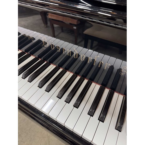 20 - Bösendorfer Strauss (c1992)A 6ft 7in Model 200 grand piano in a bright ebonised case with a maple in... 