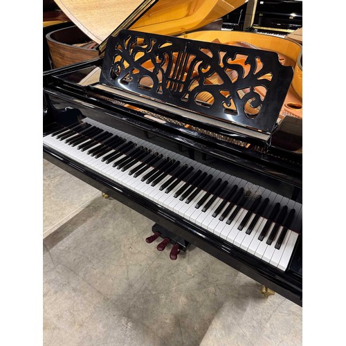 20 - Bösendorfer Strauss (c1992)A 6ft 7in Model 200 grand piano in a bright ebonised case with a maple in... 