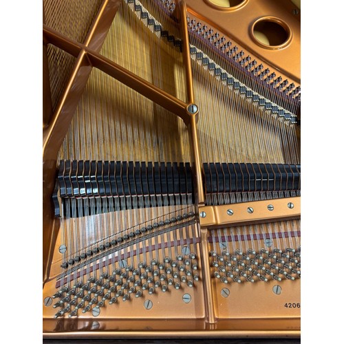 20 - Bösendorfer Strauss (c1992)A 6ft 7in Model 200 grand piano in a bright ebonised case with a maple in... 