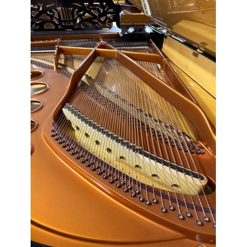 20 - Bösendorfer Strauss (c1992)A 6ft 7in Model 200 grand piano in a bright ebonised case with a maple in... 