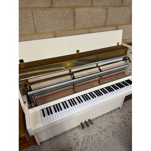 22 - Yamaha (c2005)A Model P112N upright piano in a modern bright white case; together with a stool.... 