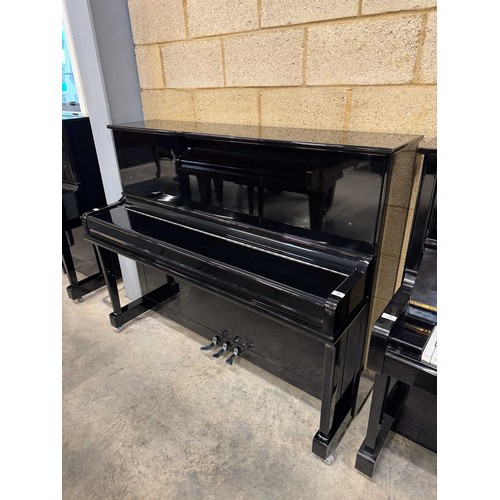 23 - Kawai (c2000s)A recent Model KU-120P upright piano in a bright ebonised case.