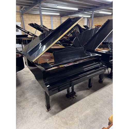 28 - Yamaha (c1977)A 6ft 1in Model C3 grand piano in a bright ebonised case on square tapered legs.