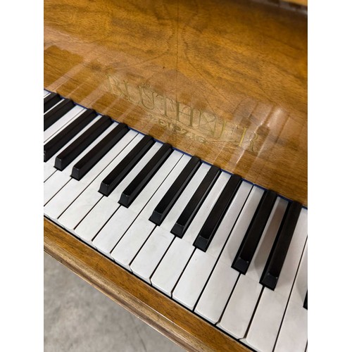 32 - Blüthner (c1937)A 4ft 11in grand piano in a walnut case on square tapered legs. IRN: 4HTFZDX6