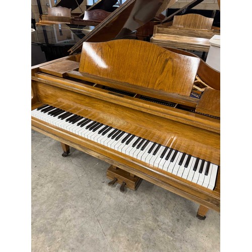 32 - Blüthner (c1937)A 4ft 11in grand piano in a walnut case on square tapered legs. IRN: 4HTFZDX6