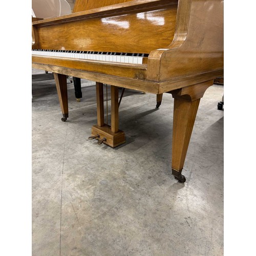 32 - Blüthner (c1937)A 4ft 11in grand piano in a walnut case on square tapered legs. IRN: 4HTFZDX6