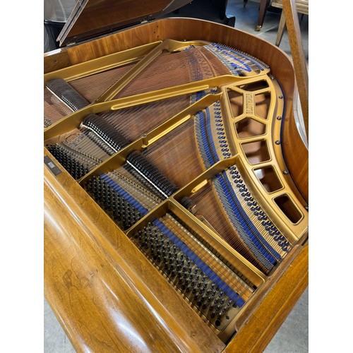 32 - Blüthner (c1937)A 4ft 11in grand piano in a walnut case on square tapered legs. IRN: 4HTFZDX6