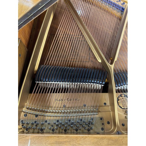 32 - Blüthner (c1937)A 4ft 11in grand piano in a walnut case on square tapered legs. IRN: 4HTFZDX6