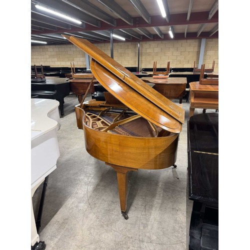 32 - Blüthner (c1937)A 4ft 11in grand piano in a walnut case on square tapered legs. IRN: 4HTFZDX6