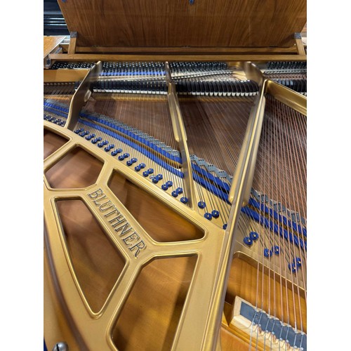 32 - Blüthner (c1937)A 4ft 11in grand piano in a walnut case on square tapered legs. IRN: 4HTFZDX6