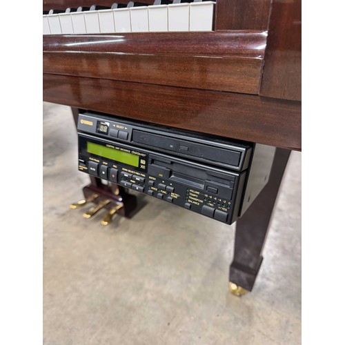 38 - Yamaha (c2020) AMENDMENT (c2000)A 5ft 8in Model DC2 grand piano in a bright mahogany case on square ... 