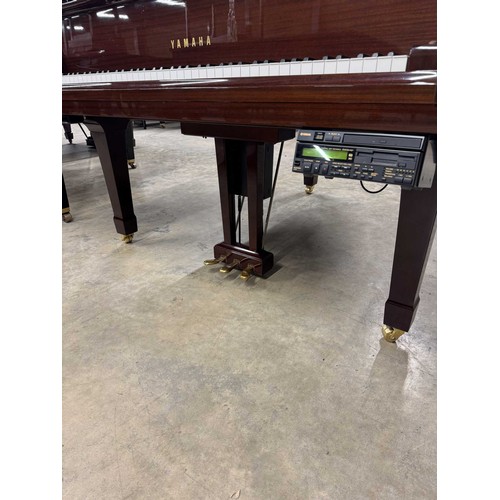 38 - Yamaha (c2020) AMENDMENT (c2000)A 5ft 8in Model DC2 grand piano in a bright mahogany case on square ... 