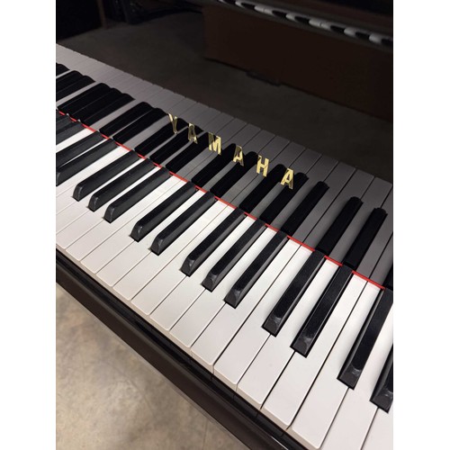 40 - Yamaha (c2003)A 6ft 3in 'Hand Made Series' Model S4 grand piano in a bright ebonised case on square ... 