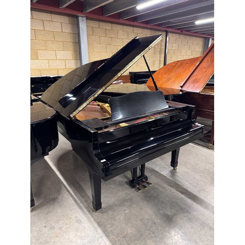 43 - Yamaha (c1982)A 6ft 7in Model C5 grand piano in a bright ebonised case on square tapered legs.