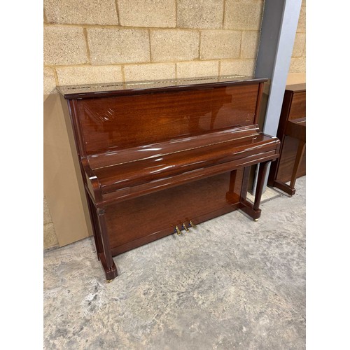 44 - Blüthner (c2006)A Model A upright piano in a traditional bright mahogany case.