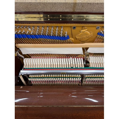 44 - Blüthner (c2006)A Model A upright piano in a traditional bright mahogany case.