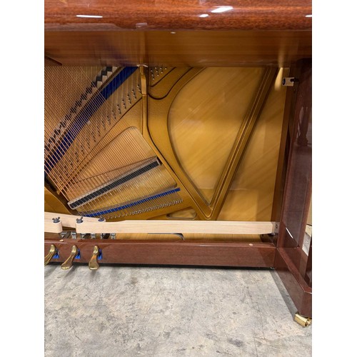 44 - Blüthner (c2006)A Model A upright piano in a traditional bright mahogany case.