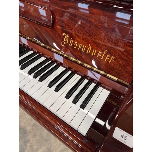 45 - Bösendorfer (c2001)A Model 130 upright piano in a bright mahogany case.