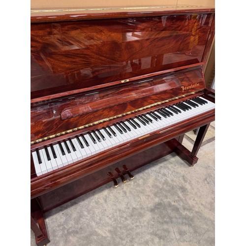 45 - Bösendorfer (c2001)A Model 130 upright piano in a bright mahogany case.