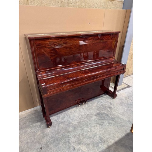 45 - Bösendorfer (c2001)A Model 130 upright piano in a bright mahogany case.